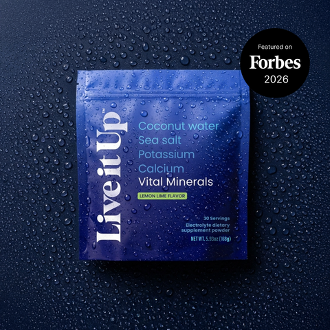 A pouch of Vital minerals set against a backdrop of water droplets and dark ocean blue colors.